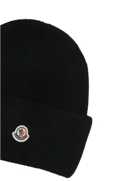 Moncler Ribbed Knit Carded Wool Beanie With Felt Logo Patch In Black