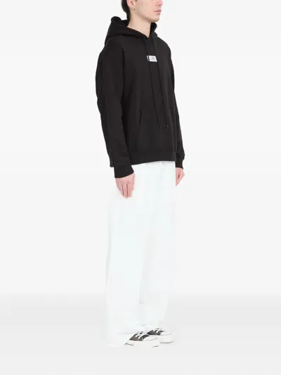 Mm6 Maison Margiela Mm6 By Maison Margiela Emblazoned Black Hoodie With Drawstring And Ribbed Finishes In Black