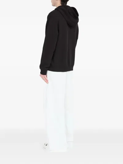 Mm6 Maison Margiela Mm6 By Maison Margiela Emblazoned Black Hoodie With Drawstring And Ribbed Finishes In Black