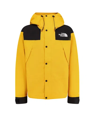 The North Face Windbreaker Jacket With Drawstring And Hood In Yellow