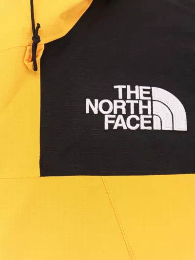 The North Face Windbreaker Jacket With Drawstring And Hood In Yellow
