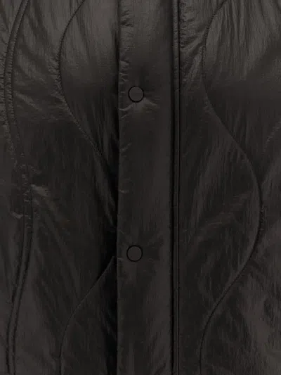 Laminar Padded And Quilted Sleeveless Jacket In Black
