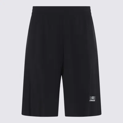 Mm6 Maison Margiela Black Salomon Edition Running Shorts In Black