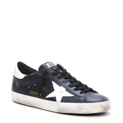 Golden Goose 'super-star' Black Low Top Sneakers With Logo Patch And Suede Details In Leather Man In Black
