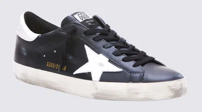 Golden Goose 'super-star' Black Low Top Sneakers With Logo Patch And Suede Details In Leather Man
