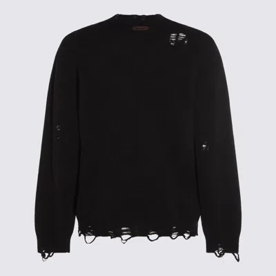 Moschino Distressed Ribbed Sweater With Cuffs And Hem In Black