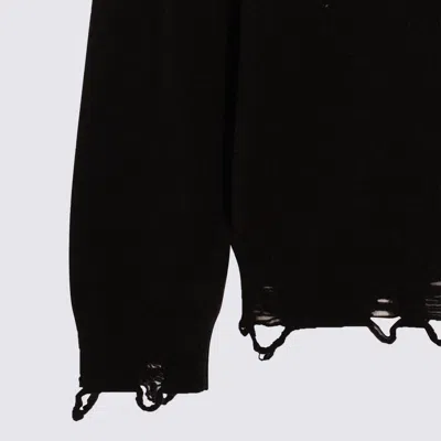 Moschino Distressed Ribbed Sweater With Cuffs And Hem In Black