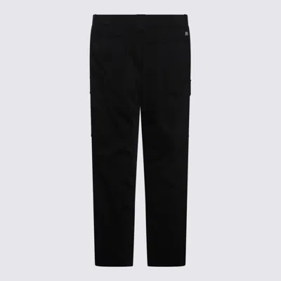 C.p. Company Trousers Featuring Various Functional Pockets In Black
