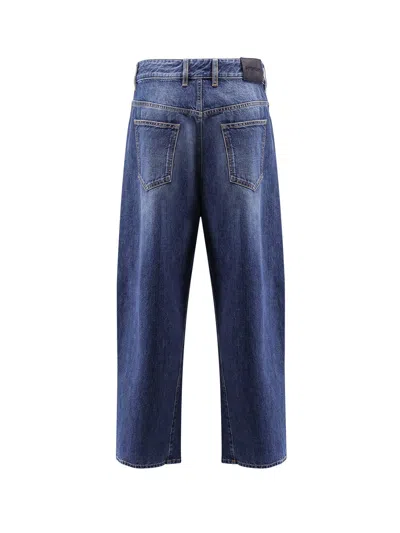 Givenchy Twisted Stone-washed Denim Jeans In Blue