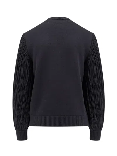 Alaïa Wool Sweater With Fringes Detail In Black