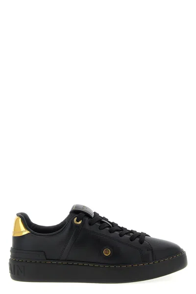Balmain Sneakers 'court' Gold-tone Detail In Black