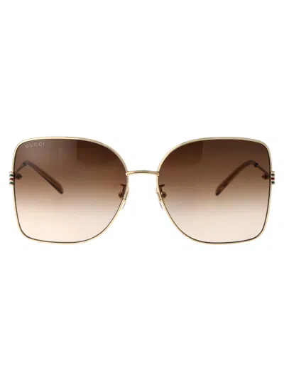 Gucci Gold Acetate Sunglasses In Gold