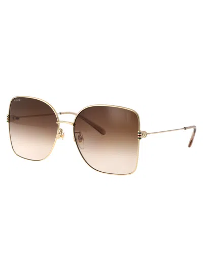 Gucci Gold Acetate Sunglasses In Gold