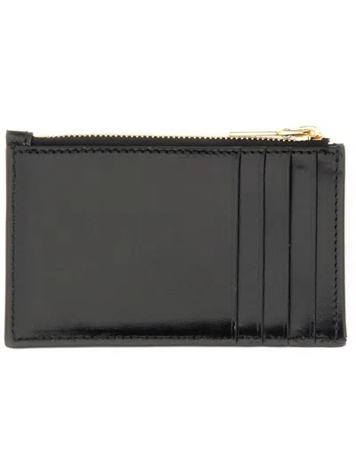 Alexander Mcqueen Logo Stamped Leather Zip Cardholder In Black