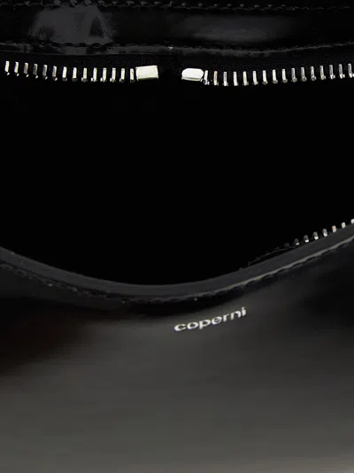 Coperni Curved Glossy Top Handle Bag In Black