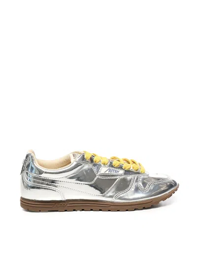 Autry Front Lace Sneakers In Bright Yellow And Shiny Silver In Gray