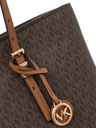 Michael Kors Monogrammed Tote Bag With Adjustable Straps And Gold-tone Hardware In Brown