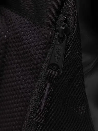 Eastpak Tecum Roll Fold-over Backpack In Black