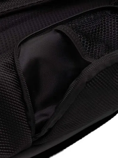 Eastpak Tecum Roll Fold-over Backpack In Black