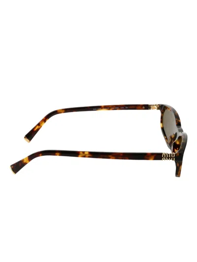 Miu Miu Tortoiseshell Rectangle Sunglasses In Brown