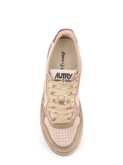 Autry Super Vintage Distressed Paneled Metallic Leather Sneakers In Neutral