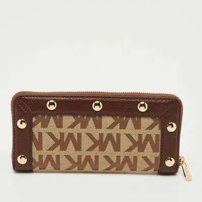 Pre-owned Michael Kors Beige/dark Brown Signature Canvas And Leather Zip Around Wallet In Sand