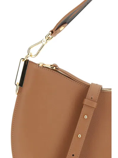 Coccinelle Large Sunup Half-moon Calfskin Shoulder Bag In Sand