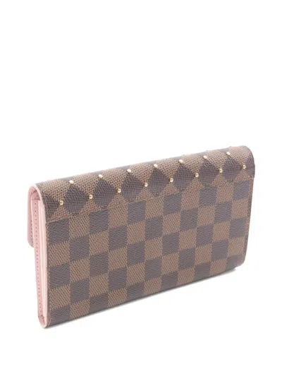 Pre-owned Louis Vuitton 2019 Sara Damier-pattern Stud Wallet In Brown