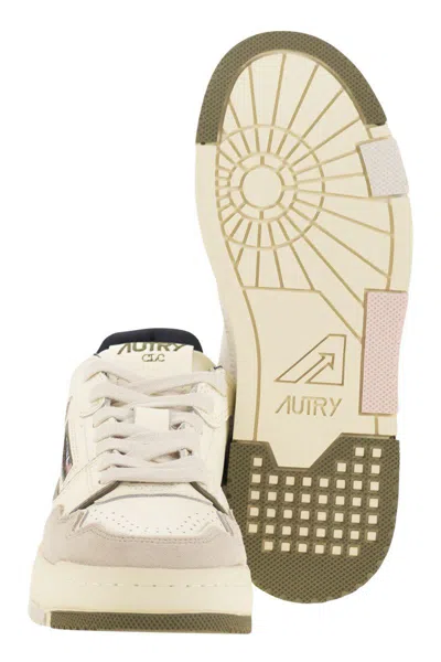 Autry Low Top Leather And Fabric Sneakers In Neutral
