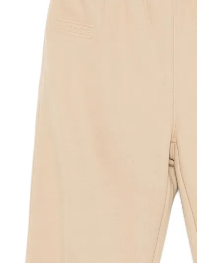 Lacoste Logo-debossed Track Pants In Neutral