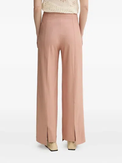 Aeron Wrap-front Split-hem Trousers In Pink