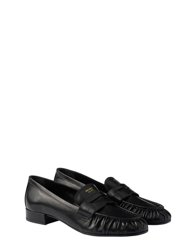 Prada Rounded Toe Loafers With Textured Detailing And Low Block Heel In Black