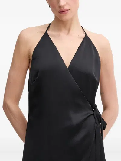 挂脖裹身式设计超长连衣裙