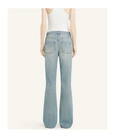 Courrèges Flared Light Wash Five-pocket Trousers In Blue