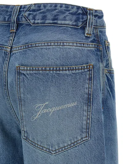 Jacquemus Wide Leg High Rise Jeans With Contrast Stitching In Blue