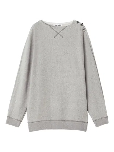 纽扣细节一字领毛衣