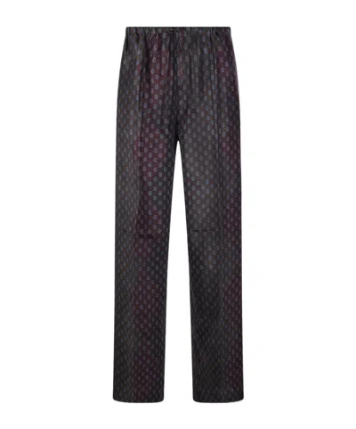Dries Van Noten Patterned Elastic Waistband Relaxed Fit Trousers In Black