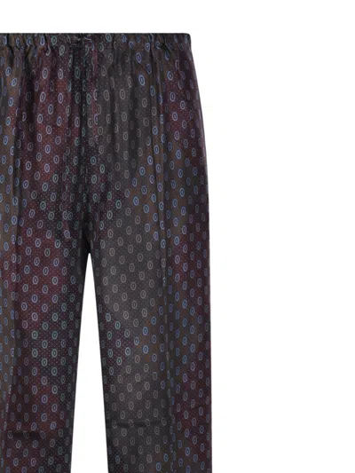 Dries Van Noten Patterned Elastic Waistband Relaxed Fit Trousers In Black