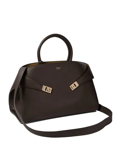 Ferragamo Hug M' Black Handbag With Logo And Gancini Buckle In Leather In Brown