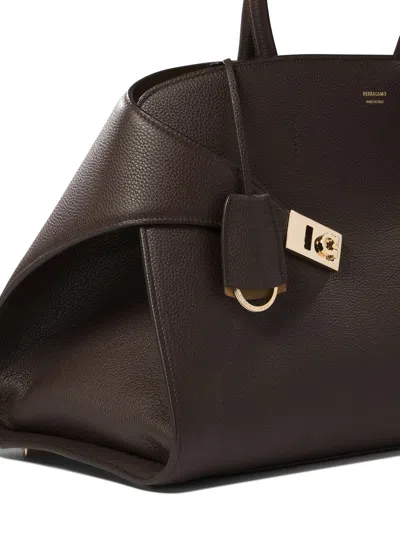 Ferragamo Hug M' Black Handbag With Logo And Gancini Buckle In Leather In Brown