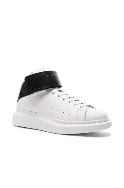 Shop Alexander Mcqueen Strap Platform High Top Leather Sneakers In Black & White
