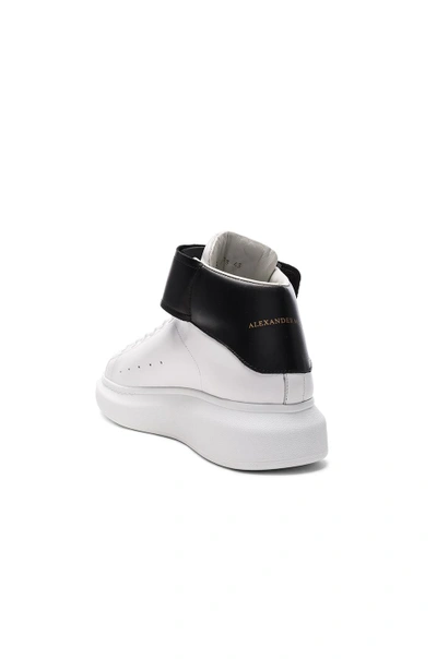 Shop Alexander Mcqueen Strap Platform High Top Leather Sneakers In Black & White