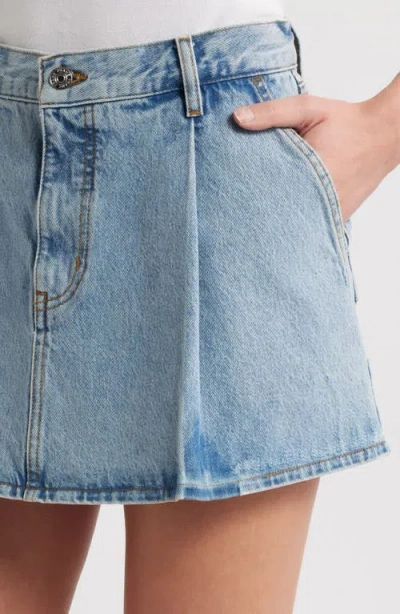 Frame Pleated Denim Mini Skirt In Outlaw In Blue