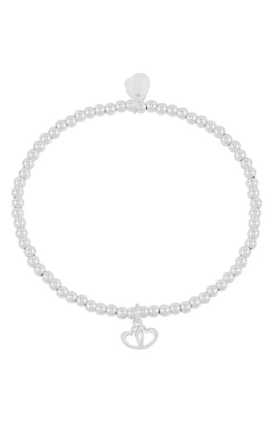 Estella Bartlett Sienna Double Heart Beaded Stretch Bracelet In Silver