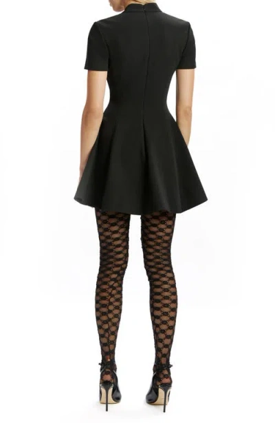 Bardot Zephyra Short Sleeve High Neck Fit And Flare Full Skirt Mini Dress In Black