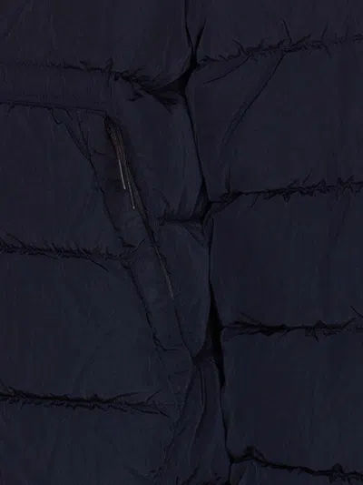 C.p. Company Blue Down Jacket With Fixed Hood And Logo Plaque On The Sleeve In Tech Fabric Man In Blue