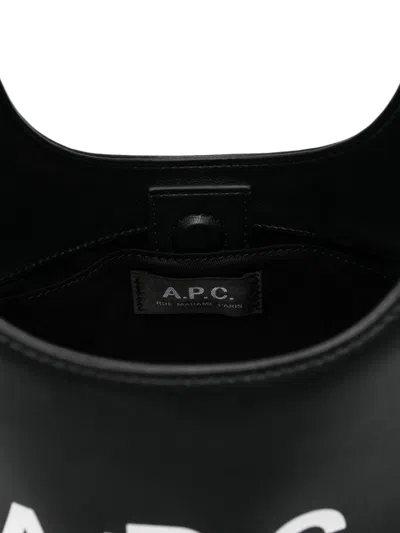 Apc Rounded Silhouette Shoulder Bag With Bold Logo In Black