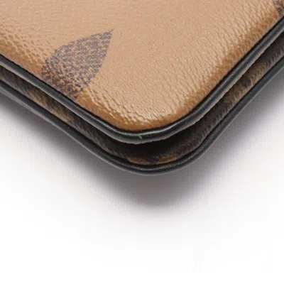 Pre-owned Louis Vuitton Beige Brown Coated Canvas Monogram Reverse Pvc Leather Pochette Shoulder Bag (pre-owne