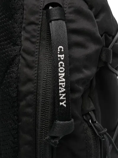C.p. Company One-shoulder Logo Backpack In Black