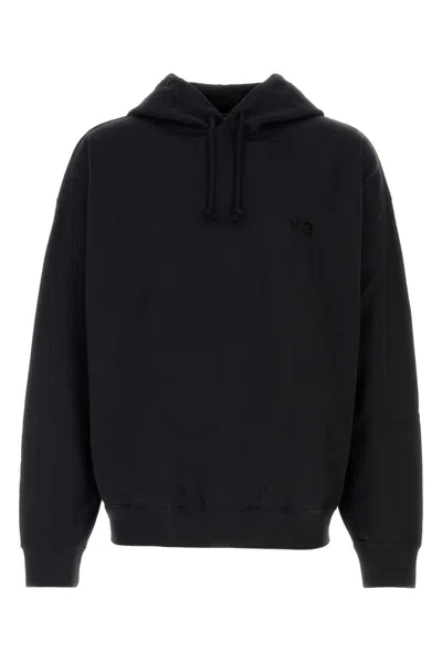 Y-3 Relaxed-fit Black Hoodie With Subtle Front Logo And Side Pockets In Black